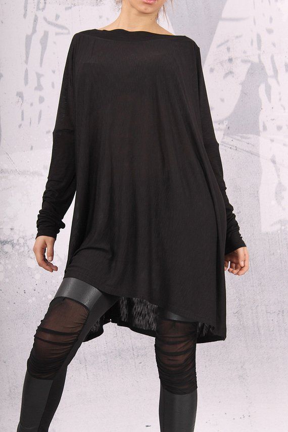 Oversized Tunic For Layering, Lagenlook Asymmetrical Tunic For Layering, Asymmetrical Lagenlook Tunic For Layering, Fall Lagenlook Dress With Asymmetrical Hem, Oversized Black Tunic For Spring, Black Oversized Tunic For Spring, Stretch Asymmetrical Dress For Fall, Fall Lagenlook Dresses With High-low Hem, Fall Asymmetrical Tunic