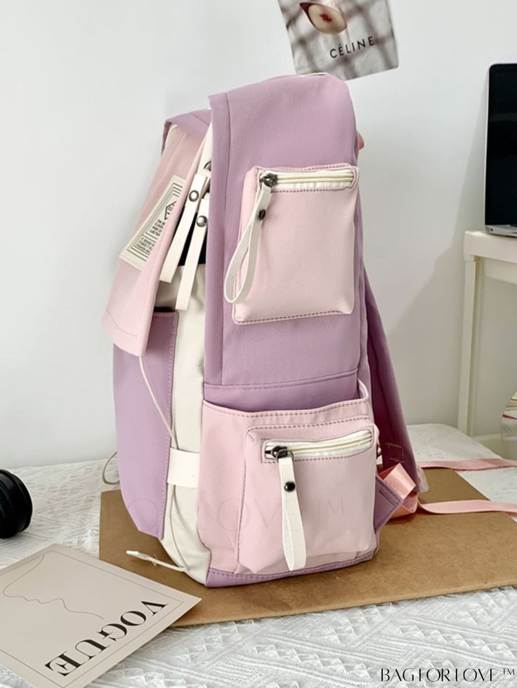 BagForLove - Versatile Letter Patch Functional Backpack for Students and Travelers, Ideal for Outdoors and School Product Description Color Multicolor Strap Type Adjustable Composition 100% Polyamide Style Preppy Pattern Type Letter Bag Size Medium Material Polyamide Closure Type Zipper Type Classic Backpack Size Chart INCH CM Handle Height Strap Length Bag Height Bag Width Bag Length 2.8 inch 37.4 inch 17.7 inch 5.9 inch 11.8 inch Handle Height Strap Length Bag Height Bag Width Bag Length 7 cm Trendy Purple Backpack For Daily Use, Trendy Purple Backpack For Travel, Large Capacity Purple Backpack For School, Purple Large Capacity Backpack For School, Purple Portable Backpack For Everyday Use, Portable Purple Backpack For Everyday Use, Casual Purple Backpack For Students, Casual Large Capacity Purple Backpack, Purple Softback Backpack For Daily Use