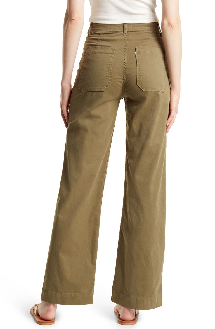 Front patch pockets refresh the look of perfectly wide-leg pants with a flattering high waist that make a retro-cool statement. 30" inseam; 20" leg opening; 12" front rise 98% cotton, 2% polyurethane Machine wash, line dry Made in the USA or imported Modern Wide Leg Pants With Welt Pockets, Chic High Rise Pants With Welt Pockets, Chic High-rise Pants With Welt Pockets, Elevated Casual Pants With Five Pockets, Retro Wide Leg Pants For Fall, Chic Full Length Bottoms With Patch Pockets, Spring Full-length Wide Leg Pants With Hip Pockets, Utility Wide Leg Bottoms With Relaxed Fit, Cotton Utility Wide Leg Pants