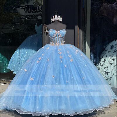 Quince Chambelanes Outfits Light Blue, Blue Dress Ball Gowns, Baby Blue Butterfly Quinceanera Theme, Pink And Blue Quinceanera Dresses, Winter Wonderland Quinceanera Dress, Blue Fluffy Dress, Baby Blue Quince Dresses, Butterfly Quince Dress, Blue 15 Dresses