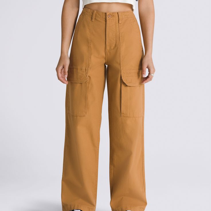 The Arroyo Wide Leg Cargo Pants is a classic workwear inspired piece with a modern style in an all-new hue. These canvas pants offer lots room, lots of style, and lots of storage with its wide-legged style and plethora of pockets. 100% Cotton fabric Relaxed fit canvas wide leg cargo pant Front and back patch pockets Side cargo pockets 12.5'' rise 28'' inseam 15.5'' leg opening | Vans Arroyo Wide Leg Cargo Pants Womens 26 Inch Solid Color Cargo Style Wide Leg Work Pants, Solid Cargo Style Wide Leg Pants For Work, Baggy Wide-leg Cargo Jeans For Workwear, Wide-leg Cargo Pants For Work With Hip Pockets, Utility Full Length Parachute Pants For Work, High Waist Utility Cotton Work Pants, Full-length Cargo Work Pants, High Waist Cotton Utility Work Pants, Full Length Work Pants With Cargo Pockets