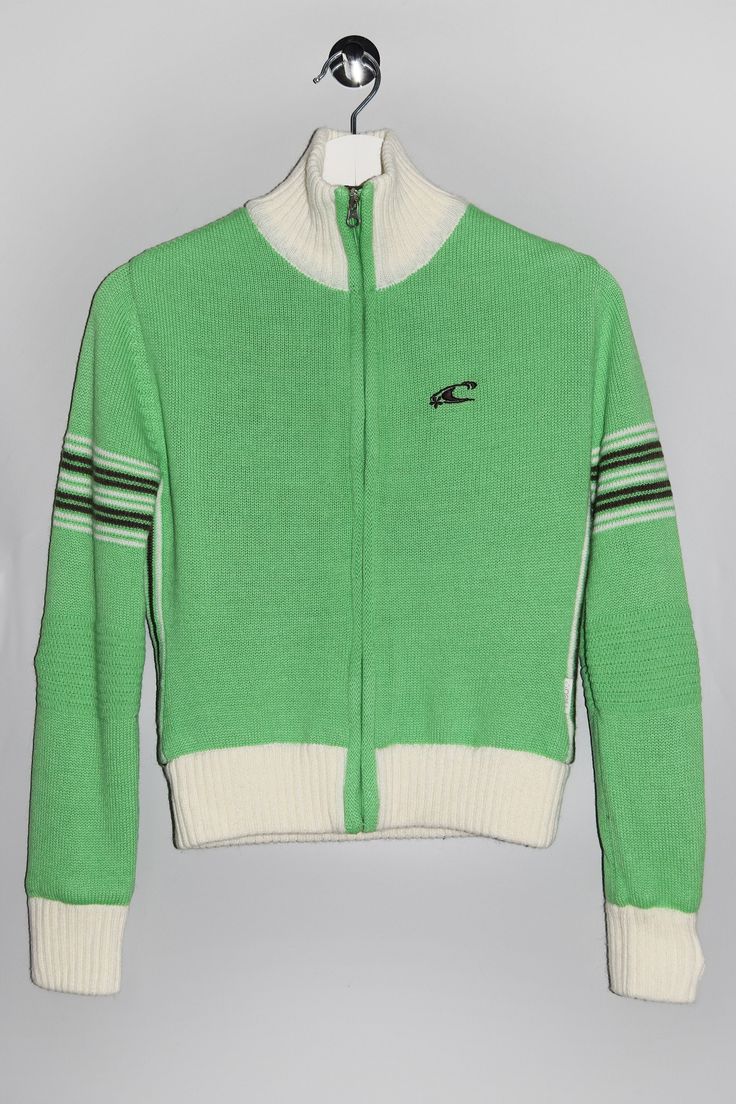 "Vintage O'Neill - Launch Series full zip sweater in bright green and creme white. - Size tag: Please always check measurements before buying. Tag reads Women's S, but we suggest it fits more like a XS for more comfortable fit. - Measurements (laying flat): Pit to Pit: 17.5\" Length: 19.5\" Sleeve: 23.5\" Pit to Cuff: 17\" Across the shoulders: 14.5\" -Wear: /Please see images for details/ Good vintage condition. -Flaws: / serious wear, tears, holes, marks or stains/ None - Fabric: Acrylic Wool Polyester *All of our items are preloved pieces so some signs of natural wear and age are to be expected. Please look through the photos carefully to check if the condition is to your satisfaction. *All efforts are made to show any defects however small imperfections may be missed. *We try to descri Fitted Green Sweater With Ribbed Cuffs, Casual Green Cardigan With Ribbed Cuffs, Fitted Green Long Sleeve Sweatshirt, Retro Green Cotton Sweater, Retro Green Winter Tops, Green Retro Winter Tops, Retro Green Winter Sweater, Sporty White Long Sleeve Cardigan, Green Retro Winter Sweater