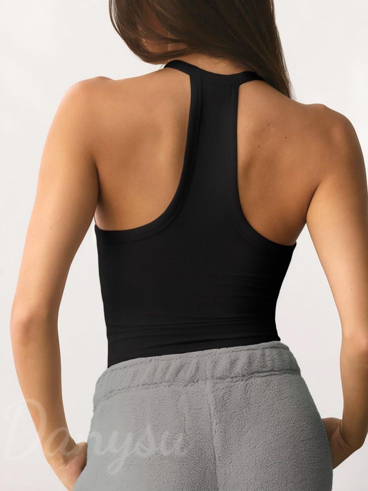 Our Cotton Rib Tank, made from 46% cotton, 46% rayon, and 8% spandex, offers softness and just the right amount of stretch for all-day comfort. The Danysu racerback design features removable pads and a double-layered breast area for extra support and coverage, eliminating the need for a bra. With its V-neckline and racerback silhouette, this fitted full-length tank exudes a street-style vibe. It pairs effortlessly with yoga pants, shorts, skirts, leggings, jeans, or sweatpants for a stylish ense Shorts Skirts, Racerback Tank Top, Neon Green, Racerback Tank, Yoga Pants, Design Features, Full Length, Built In, Sweatpants