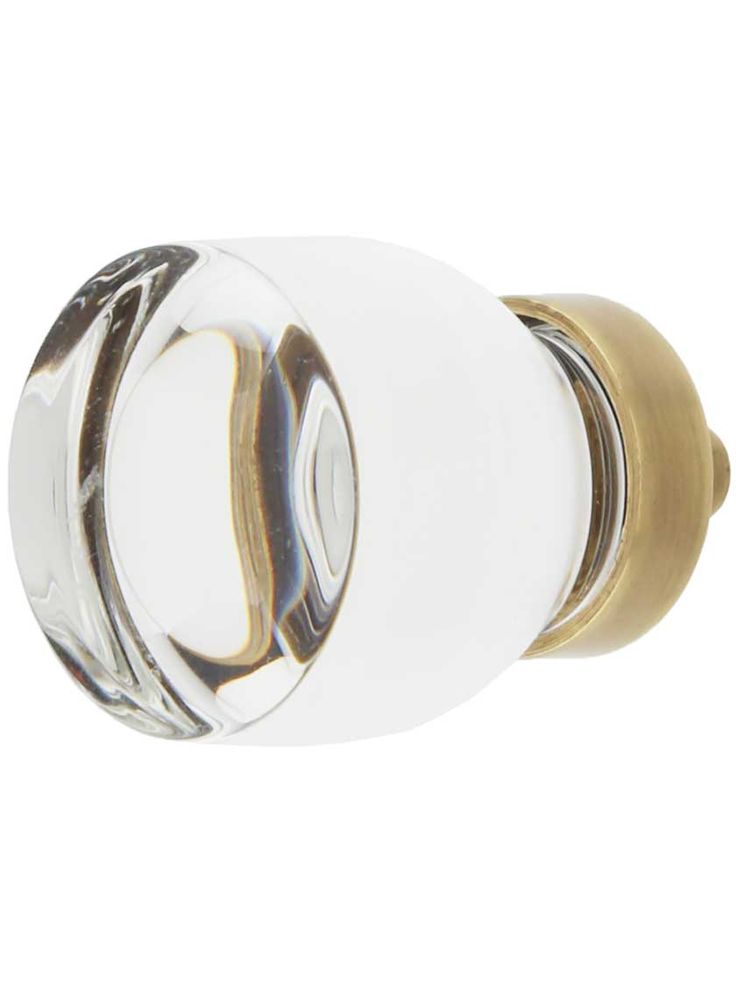 an image of a door handle on a white background with gold trim and round knobs