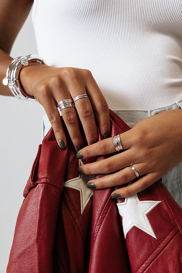 Add a dainty finish to any look with our trendy 'Sneak Away Ring Set' featuring 15 solid silver bands perfect for stacking! Silver Bands, Happy Photos, Faux Leather Backpack, Photo Necklace, Model Fits, Women Clothing Boutique, Silver Band, Online Womens Clothing, Ring Set