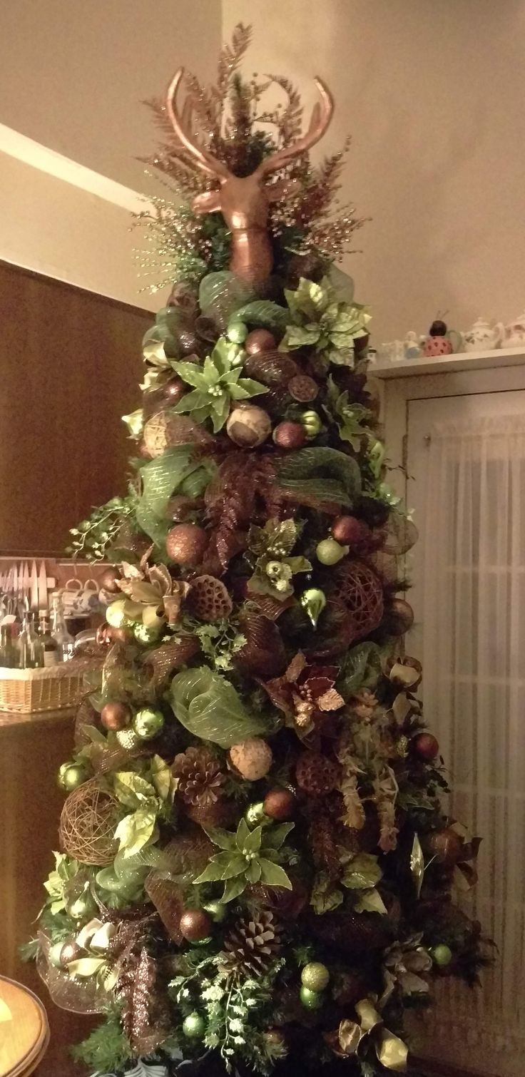 a decorated christmas tree in a living room