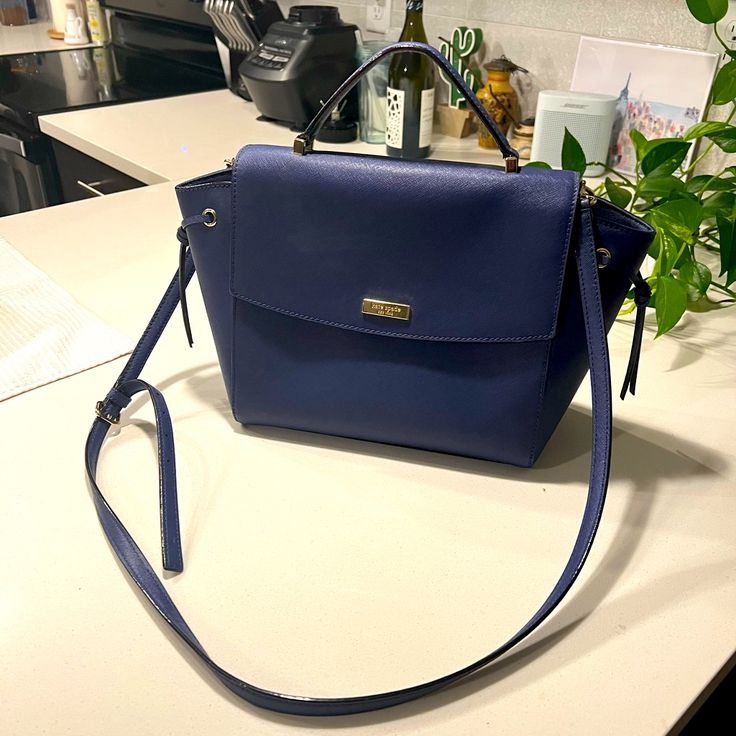 Brand New Condition No Stains Or Scratches Navy Blue Kate Spade Satchel Bag Blue Satchel For Summer Travel, Casual Blue Satchel With Detachable Handle, Versatile Blue Crossbody Satchel, Versatile Blue Top Handle Satchel, Blue Travel Satchel With Adjustable Handle, Kate Spade Blue Shoulder Bag With Adjustable Strap, Blue Summer Shoulder Bag With Detachable Strap, Blue Shoulder Bag With Detachable Strap For Summer, Versatile Blue Satchel With Adjustable Strap