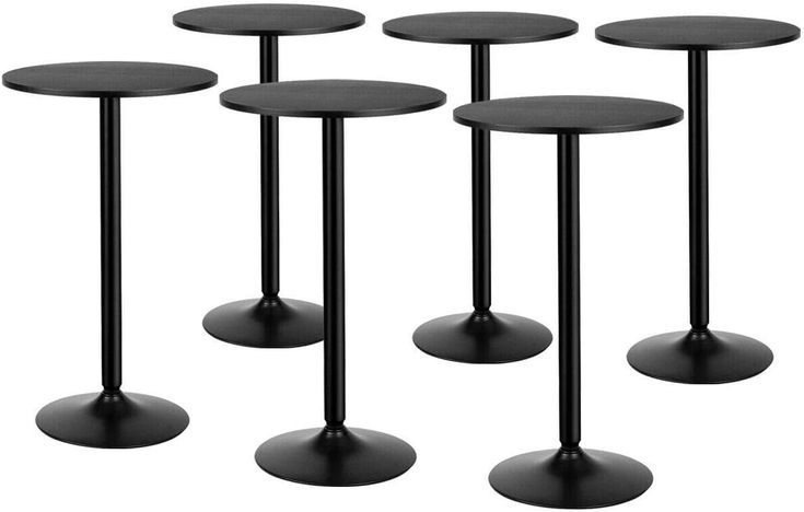 four black round tables with metal bases on each side, all in different shapes and sizes