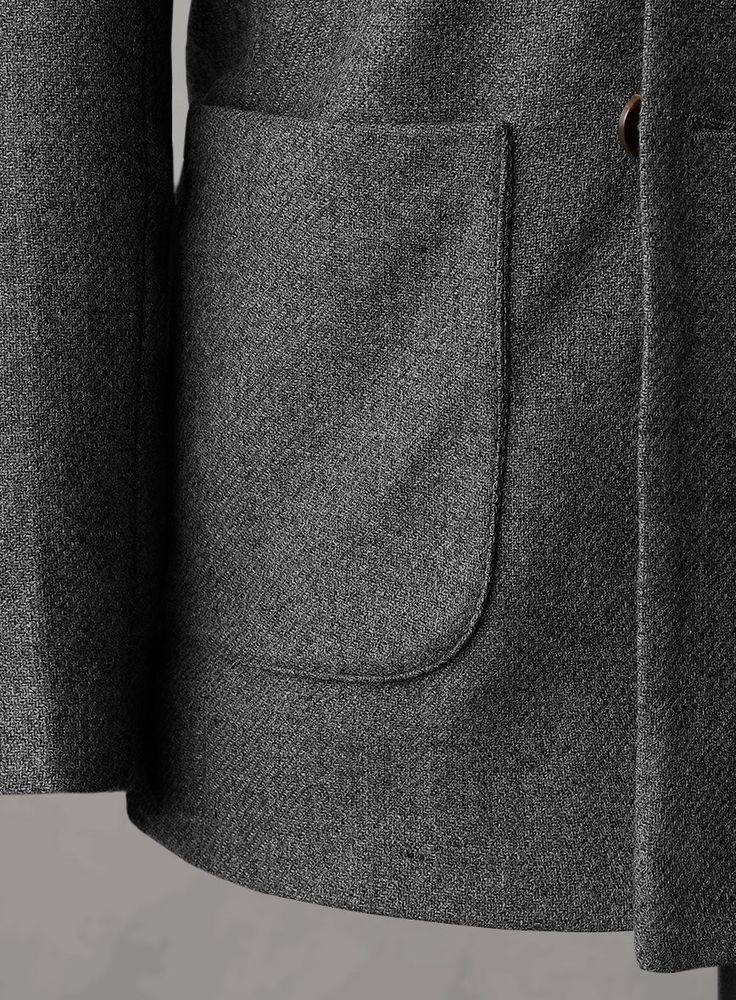 Create your own ideal style, making it unique for yourself and identifiable for others with our Gray Heavy Tweed Jacket. Crafted from pure wool, the gray shade has a very friendly vibe and is a definite keeper for all your important occasions. 
 
Look Includes   Gray Heavy Tweed Fabric  Double Breasted Jacket Style   Wide Peak Lapel (3.75")    Faux Horn Brown  Buttons  Double Vent  Four Cuff Buttons    Click 'Customize Now' to modify the look if needed.  
 
Lining: Viscose; Dry Clean. Grey Tweed Suit, Herringbone Tweed Jacket, White Linen Suit, Green Velvet Jacket, Peaky Blinders Suit, Royal Blue Suit, Herringbone Tweed, Grey Tweed, Beautiful Suit