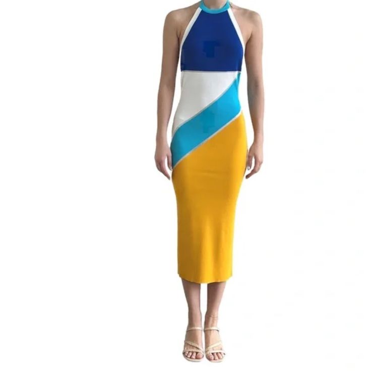 The Kelley Solid & Striped Color Block Dress. A Fabulous Color Combo In A Soft Mini-Ribbed Stretch Knit Makes This One A Very Comfortable Dress! Featuring A Low Back And Halter Style Neck Tie Which Adjusts For The Perfect Fit. The Yellow, Blue, Turquoise, And White Are Separated By A Sheer Silver Mesh Diagonal For A Touch Of Fun! Perfect For Vacation, Resort Wear, Daytime, Or Evening! $268 Retail Small Bust 12" Stretches To 16" Length 48" 65% Viscose 35%Nylon Vacation Holiday Resortwear Colorblo Color Block Summer Dress With Stretch, Spring Fitted Dress With Contrast Color, Fitted Spring Dress With Contrast Color, Summer Party Dress With Contrast Color, Chic Yellow Color Block Dress, Stretch Color Block Party Dresses, Color Block Stretch Dress For Party, Party Dresses With Color Block And Stretch Fit, Fitted Color Block Midi Dress For Summer