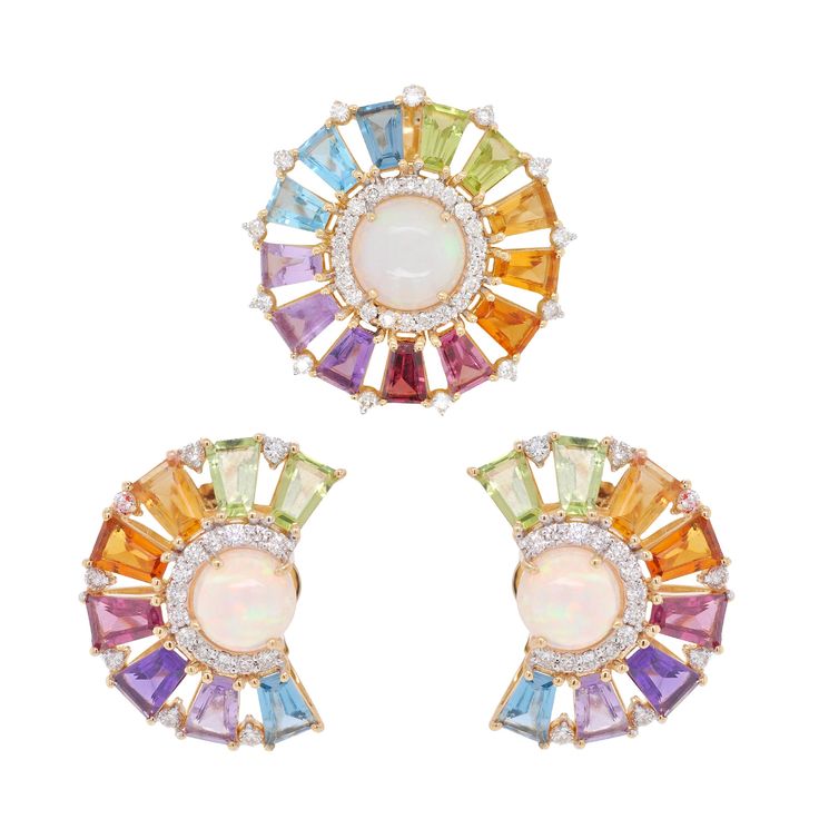 Our 18K Gold Rainbow Ferris Wheel Opal Diamond Circle Set is a mesmerizing blend of color, elegance, and whimsical charm. This exquisite set includes a pendant necklace and matching earrings, both meticulously crafted to capture the vibrant beauty of rainbow gemstones and the captivating allure of opal. Fine Jewelry Multicolor Cabochon Gemstones, Multicolor Cabochon Gemstones Fine Jewelry, Multicolor Cabochon Gemstones For Fine Jewelry, Elegant Multicolor Cabochon Gemstones, Elegant Multicolor Pendant Gemstones, Elegant Multicolor Gemstone Pendant, Elegant Round Rainbow Earrings, Elegant Rainbow Jewelry With Gemstone Accents, Elegant Rainbow Jewelry With Matching Earrings