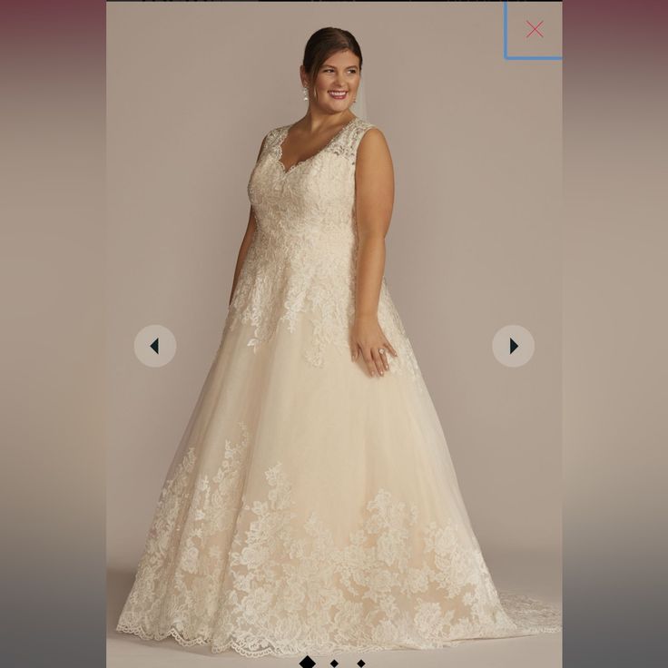 a woman in a wedding dress is smiling for the camera