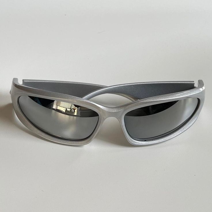 Y2k 2000s Vintage Style Chrome Silver Surfer Sunglasses Silver Frame With A Reflective Lense These Glasses Are Unisex :)! Uva Uvb Protection Brand New Shipping:$5 Silver Y2k Sunglasses, Biker Sunglasses Aesthetic, 2000s Sunglasses Aesthetic, Cybercore Glasses, Y2k Sunglasses Aesthetic, Rural Cybercore, Surfer Sunglasses, Cool Sunglasses Aesthetic, 2000 Glasses