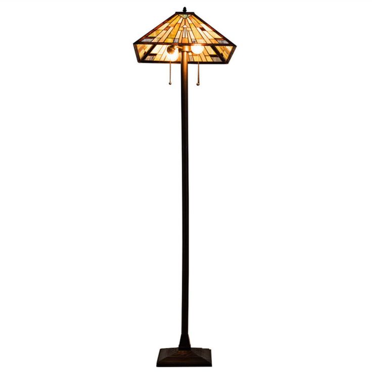 a floor lamp that is on top of a wooden base and has a glass shade