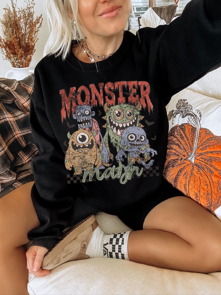 Show off your spooky aesthetic in our trendy monster mash shirt. This retro halloween sweatshirt is slightly distressed and oversized, perfect for a cozy fall outfit. * Ultra soft * Distressed design * Pre-shrunk * Universal fit * True to size * DTG Printing * Brand - Gildan Refunds/Exchanges: * No Cancellations * No returns/exchanges * All sales are final Sizing: Our graphic tees and sweatshirts are a true to size standard unisex fit. For an oversized look, please size up. For a TShirt dress fi Punk Halloween Sweater For Streetwear, Halloween Punk Style Streetwear Sweater, Oversized Punk Halloween Sweatshirt, Oversized Punk Sweatshirt For Halloween, Halloween Punk Long Sleeve Sweater, Punk Style Long Sleeve Graphic Sweatshirt, Punk Style Long Sleeve Sweatshirt With Graphic Print, Grunge Halloween Sweater For Streetwear, Halloween Graphic Print Sweatshirt For Streetwear