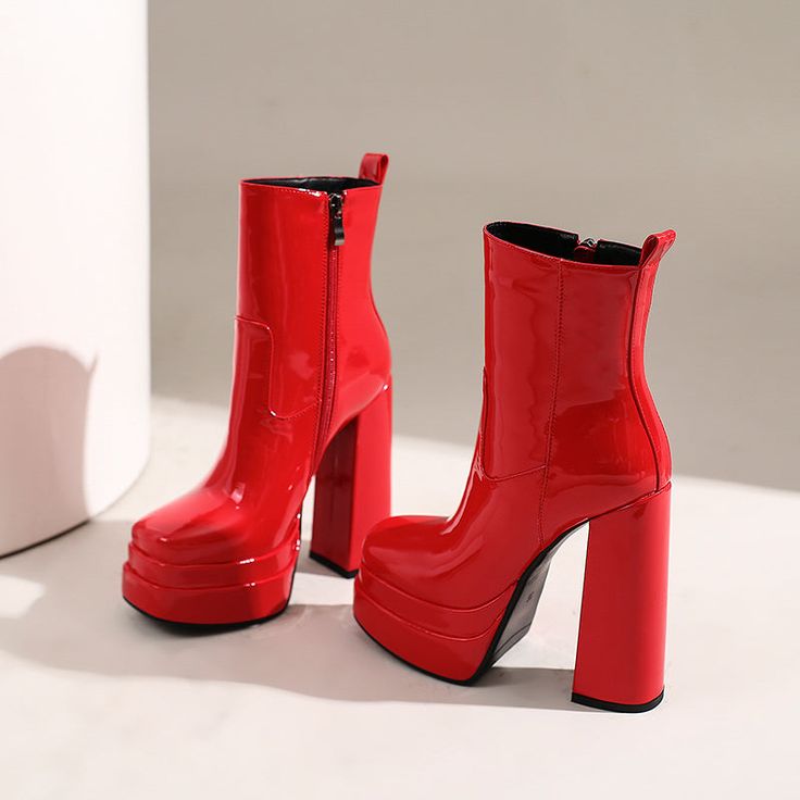 Introducing our newest arrivals ââ‚?the Red Platform Boots! A chic and stylish twist on the classic platform boot. these square-toe beauties are perfect for making a statement. The lush patent leather and chunky block heel add a touch of luxury. while the green hue is perfect for standing out from the crowd. Upper: Patent Leather Lining: Short Plush Outsole: Rubber Toe: Square Toe Closure: Zip Heel: 14cm/5.5'' Platform: 4cm/1.5'' Shaft: 13.5cm/5.3'' Circumference: 25cm/9.8'' Color: Green. Black. Trendy Mid-calf Boots With Chunky Platform And High Heel, Red High Heel Platform Boots For Winter, Bold Platform Boots With Chunky Platform, Red High Heel Platform Boots For Fall, Trendy Platform Boots In Polyurethane, Red Ankle-high Platform Boots For Parties, Trendy High Heel Polyurethane Boots, Red High Ankle Platform Boots For Party, Trendy Red Platform Boots With Round Toe