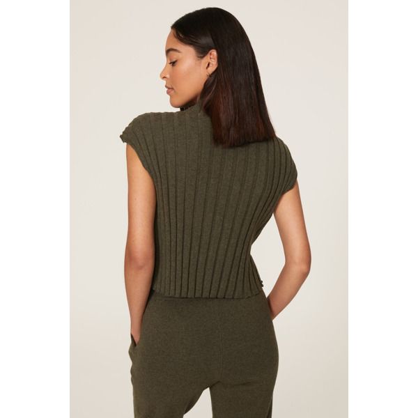 Green knit (95% Cotton, 5% Cashmere).Sweater. Mock neckline. Cap sleeve. Pull-on. 18" from shoulder to hemline. Imported. Chic Ribbed Funnel Neck Top, Chic High Neck Top With Ribbed Collar, High Neck Knit Sweater With Ribbed Neckline, Casual Knit Mock Neck Top For Fall, Knit Sweater With Ribbed High Neckline, Knit Turtleneck Sweater With Ribbed Neckline, Casual Mock Neck Knit Top For Fall, Chic Tops With Ribbed Collar For Layering, Fall Crew Neck Sweater Vest