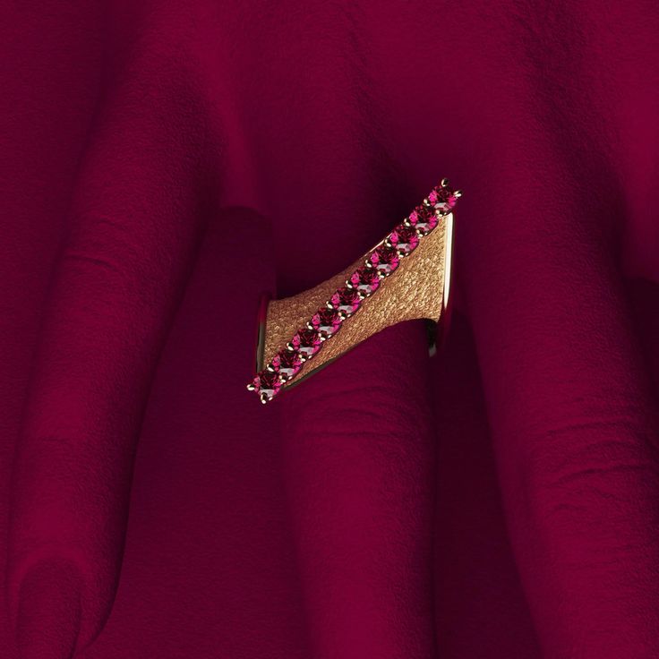 Discover the elegance of Italian craftsmanship with our Modern Twisted Gold Ring, featuring a sophisticated design and exquisite attention to detail. Created by Oltremare Gioielli, this luxurious ring showcases a beautifully crafted twist with polished edges and earth-textured surfaces, embodying both modern style and timeless elegance. The top ridge is adorned with 10 round, natural rubies (2.8mm each, approximately 0.82 carats), adding a touch of vibrant color and brilliance. Handcrafted in It Luxury Evening Rings With Gemstone, Luxury Marquise Ruby Ring, Luxury Ruby Ring With Diamond In Yellow Gold, Luxury Ruby And Diamond Ring In Yellow Gold, Yellow Gold Gemstone Rings For Evening, Evening Fine Jewelry Diamond Cut Diamond Ring, Fine Jewelry Diamond Ring For Evening, Luxury Diamond Cut Diamond Ring For Evening, Luxury Diamond Cut Ring For Evening