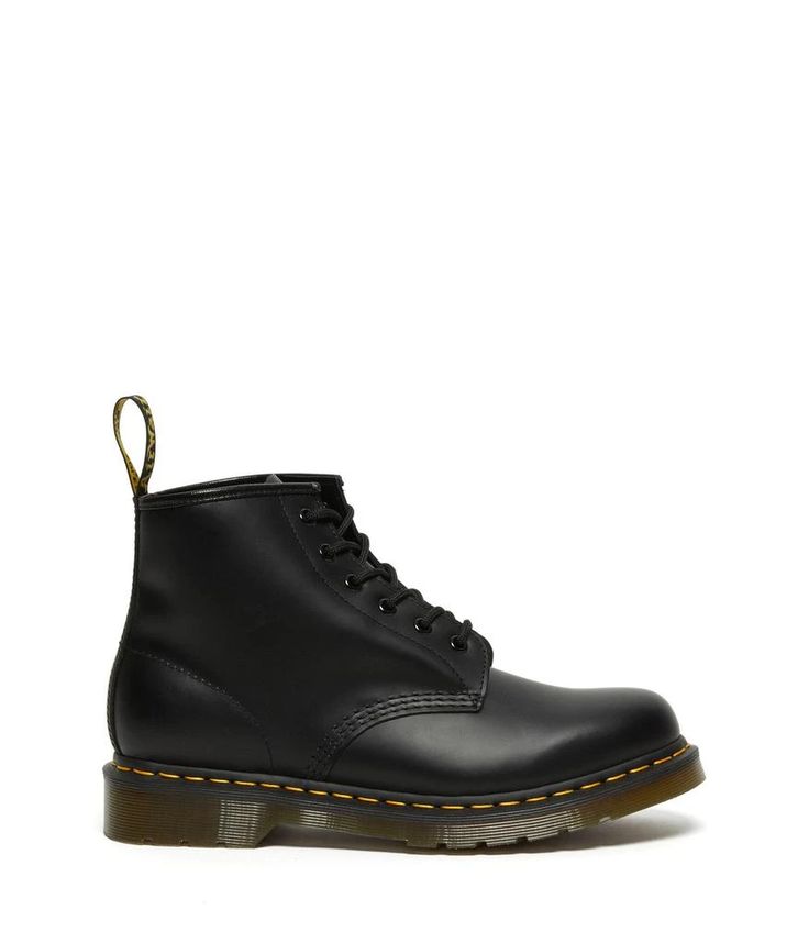 The Dr. Martens® 101 Yellow Stitch boots embodies all the classic clean lines, standout stitching, and edgy attitude of the vintage utilitarian work boot, but in a lower-cut design and a smooth leather construction..Lace-up boots have a smooth leather construction made of a firm, finished leather with a smooth, semi-bright appearance..Six-eyelet boot with sturdy fabric laces for a secure fit..Features classic Doc's DNA including grooved edges, a yellow welt stitch, and a scripted heel loop..Goodyear® welt provides both durability and flexibility..Breathable textile lining..Cushioned insole for long-lasting underfoot support..Air-cushioned rubber outsole is oil, fat, acid, petrol, alkaline resistant and has excellent slip and abrasion resistance..Imported..Product measurements were taken us Classic Chukka Boots For Workwear In Winter, Classic Winter Chukka Boots For Workwear, Classic Winter Workwear Chukka Boots, Casual Ankle Combat Boots For Work, Classic High-top Martin Boots For Fall, Classic Fall Boots With Lug Sole, Casual High-top Moto Boots For Work, Casual Workwear Moto Ankle Boots, Classic Fall Moto Boots With Lug Sole