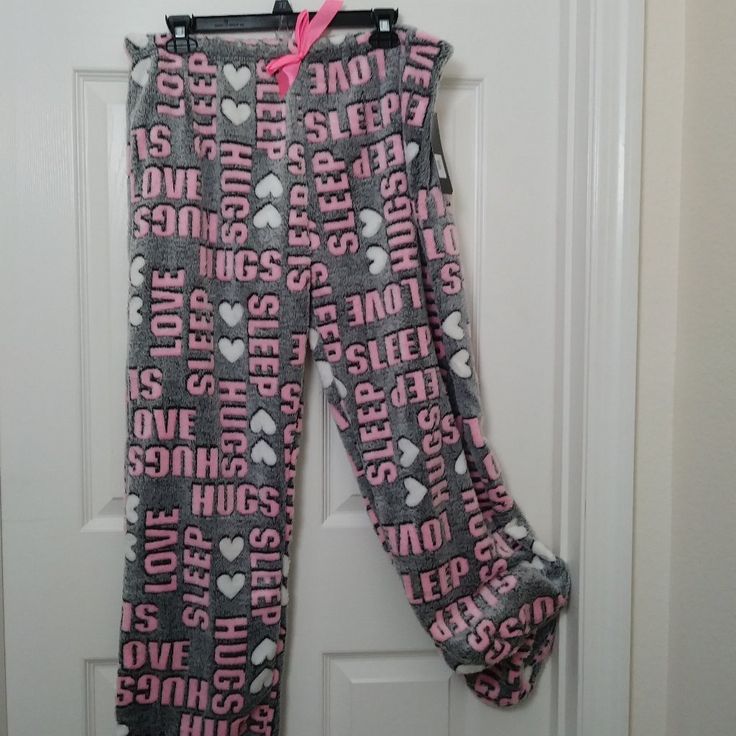 Weekending Soft And Cozy Pajama Pants Grey Pink Xl Super Soft And Cozy Grey Pajama Pants With White Hearts, Hugs, Love In Pink All Over. This Pajama Pant Is Perfect When The Temperature Drops And You Want To Be Warm And Comfortable. Irresistibly Soft And Cozy, These Fleece Pajama Pants Are Very Cute And Comfy For Everyday Wear And Lounging Around. Size: Xl Elastic Waist With A Little Bow 40” L X 29” Inseam X 17.5” W- Elastic 100% Polyester Hand Wash Comfortable Pink Sleepwear For Sleepover, Comfortable Sleepwear Long Pants For Sleepover, Comfortable Long Pants Sleepwear For Pajama Party, Comfortable Pink Sleepwear For Loungewear, Comfortable Pink Sleepwear, Comfortable Pink Lounging Pants, Comfortable Pink Sleepwear For Lounging, Comfortable Pink Lounging Sleepwear, Cozy Pink Cotton Pants