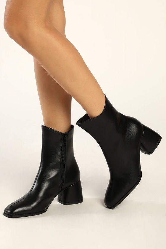 The Lulus Windal Black Square Toe Mid-Calf Boots is ready to make every 'fit a chic moment this season! Smooth faux leather shapes a squared-off toe that meets a 7"" mid-calf shaft with a 10"" circumference and a curved topline. A 6"" zipper at the instep and a chunky block heel complete the look! 2. 75" wrapped block heel. Cushioned insole. Rubber sole has nonskid markings. ALL MAN MADE MATERIALS. Imported. Lulus | Windal Black Square Toe Mid-Calf High Heel Boots | Size 6. Faux Leather Block Heel Shoes For Fall, Faux Leather Block Heels For Fall, Fall Faux Leather Heels With Block Heel, Fitted Boots With Stacked Heel And Square Toe, Fall Square Toe Heeled Boots With Reinforced Heel, Trendy Wide Calf Almond Toe Heeled Boots, Trendy Wide Calf Heeled Boots With Almond Toe, Trendy Faux Leather Heeled Boots With Block Heel, Trendy Faux Leather Boots With Sculpted Heel