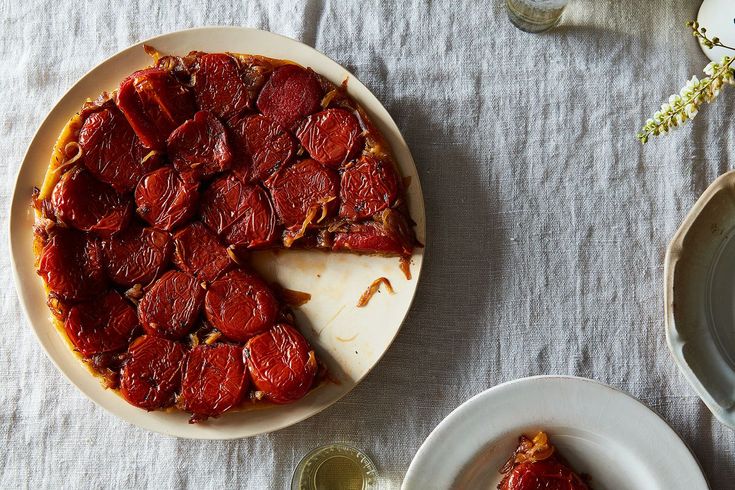 a pizza on a plate with one slice missing