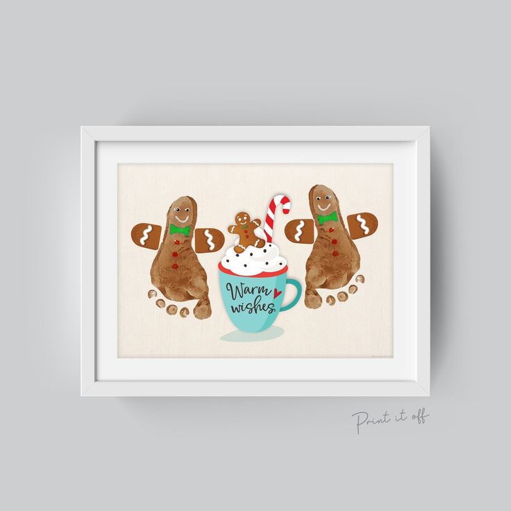 two brown dogs sitting next to each other in front of a white framed wall with the words merry christmas written on it