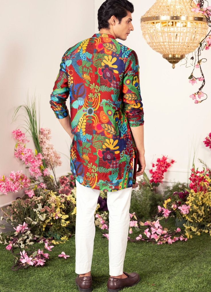 Introducing the Enchanted Forest Printed Kurta , an ideal ensemble for Mehendi and Sangeet. This printed kurta features a various vibrant botanical motifs on a crimson background, bringing an elegant vibe to your celebrations. Buy matching pants to complete the look here. Composition : Organza Satin Care: Dry Clean Only and Vacuum Storage This product can be customized for sleeves, length and colour Delivery : 2-4 weeks as the product is hand crafted. Check Size Guide or choose MySize for free customisation (All Sizes above XL can be made at 15% additional cost) For more information and sizes please contact fabiliciousfashion@gmail.com or visit our Copenhagen studio. About the Designer : Get ready to be blown away by the incredible talent of Juhi Bengani! This Kolkata-born actuary has disc Bohemian Multicolor Wedding Kurta, Festive Multicolor Embroidered Printed Sets, Festive Silk Kurta With Digital Print, Fitted Multicolor Kalamkari Print Kurta, Fitted Multicolor Kurta With Kalamkari Print, Multicolor Bollywood Style Kurta For Festival, Bollywood Style Digital Print Kurta For Summer, Bollywood Style Kurta With Digital Print For Summer, Bollywood Style Summer Kurta With Digital Print