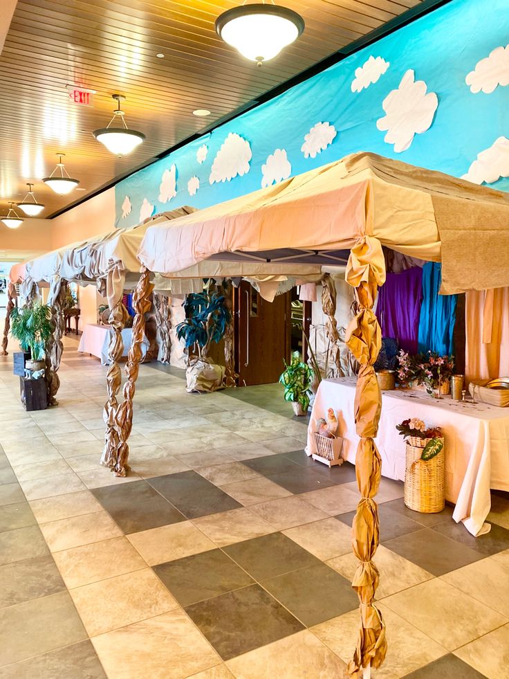 Pop up tents covered in drop cloths and spare fabric. Vbs Nazareth Decorations, Biblical Theme Party, Vbs Town Of Bethlehem Scenery, Biblical Times Decorations, Bible Party Decorations, Come To The Table Vbs, Vbs Bible Times Decorations, Bible Times Marketplace, Biblical Marketplace Ideas