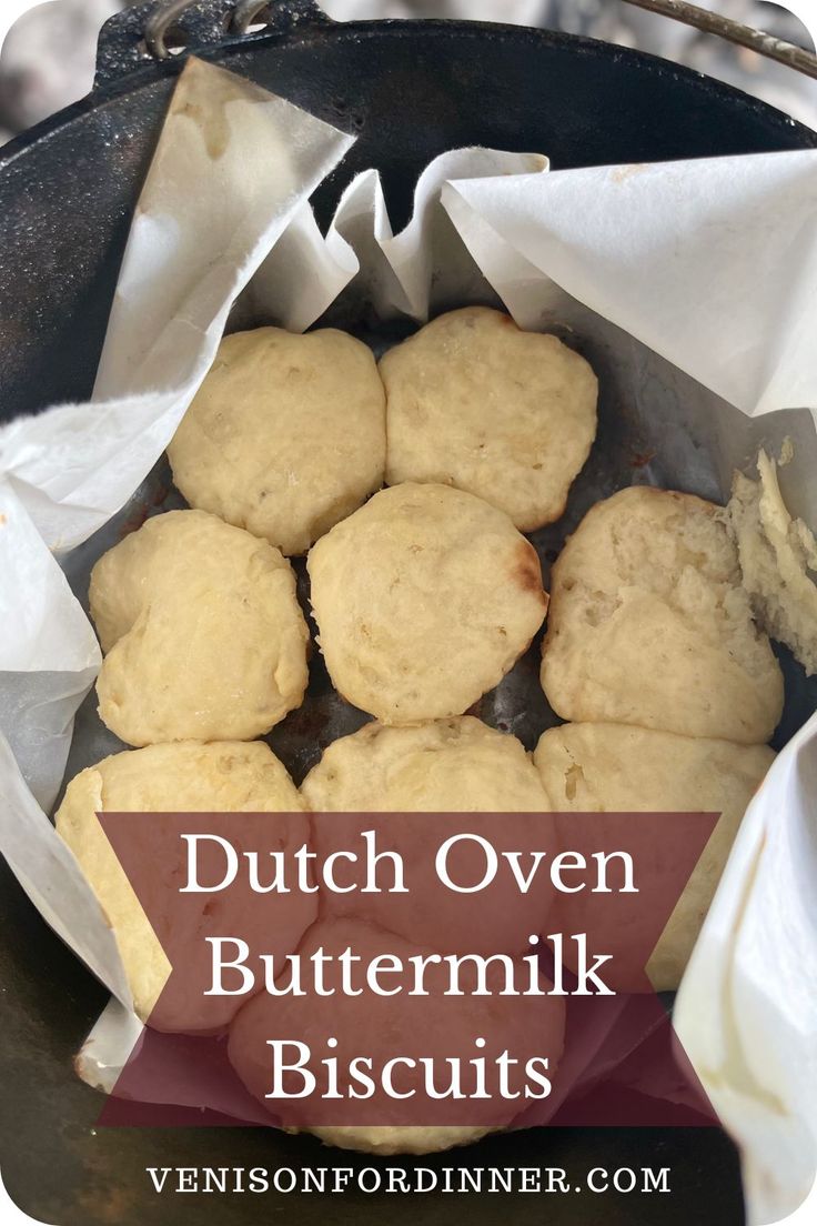 dutch oven buttermik biscuits in a cast iron skillet with text overlay that reads, dutch oven buttermik biscuits