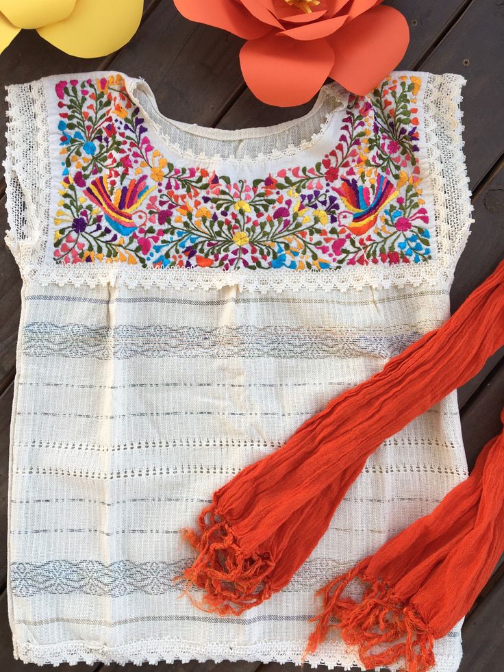 "This beautiful hand embroidered Mexican blouse is comfortable, fresh and stylish With beautiful flower embroidered detailed work on the top Get the Boho style you like The fit of the blouse is loose and fresh Perfect to wear with your favorite jeans Is a MUST HAVE in you wardrobe Every blouse is individually handcrafted It may have slight imperfections Color may vary on stitching as each blouse is unique Perfect gift idea Accessories sold separately **HAND WASH ONLY** air drying and warm iron i Summer Cotton Peasant Top With Intricate Embroidery, Traditional Embroidered Peasant Top For Beach, Traditional Spring Peasant Top With Embroidered Neckline, Summer Folk Style Embroidered Top With Chikankari, Peasant Embroidered Top With Intricate Design For Summer, Summer Folk Style Chikankari Embroidered Top, Traditional White Peasant Top With Embroidered Neckline, Peasant Embroidered Top For Summer, Peasant Style Embroidered Top For Summer