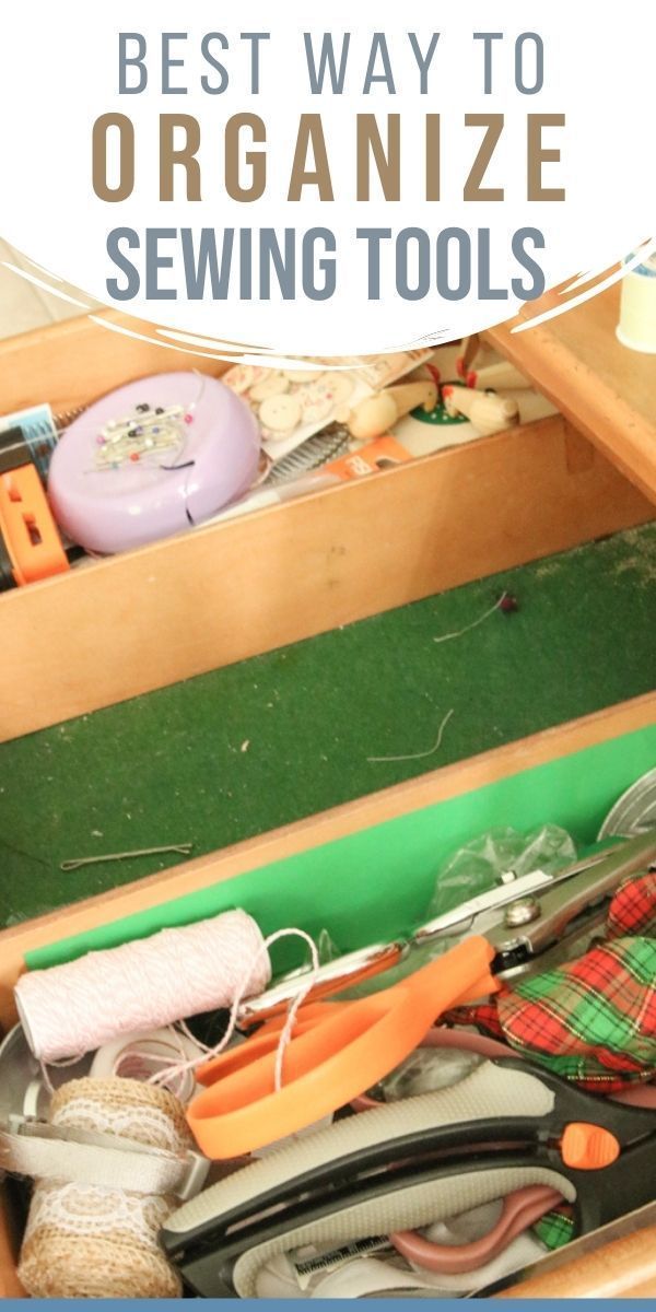 the best way to organize sewing tools is by using an open drawer with scissors and thread