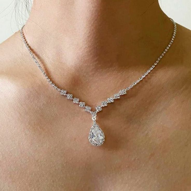 Brand New 2ct Diamond Women's Oval Necklace 18k White Gold Plated Sterling Silver Genuine 2ct Lab Created Diamonds Measurements: Chain Length - Adjustable From 16" - 22" 1.7" X .6" Retail Price $300 Buy With Confidence From Top Rated Seller W/ A 99%+ Feedback Rating! A0093 (Id-573-) Elegant Teardrop Drop Necklace For Formal Occasions, Classic White Gold Drop Bridal Necklace, Formal Teardrop Drop Necklace With Diamond Cut, Classic Drop Necklace For Anniversary, Elegant Teardrop Drop Necklace For Anniversary, Pear-shaped Diamond Necklace For Formal Occasions, Pear-shaped Diamond Necklace For Formal Events, Formal Pear-shaped Crystal Necklaces, Classic Teardrop Necklace With Elegant Design