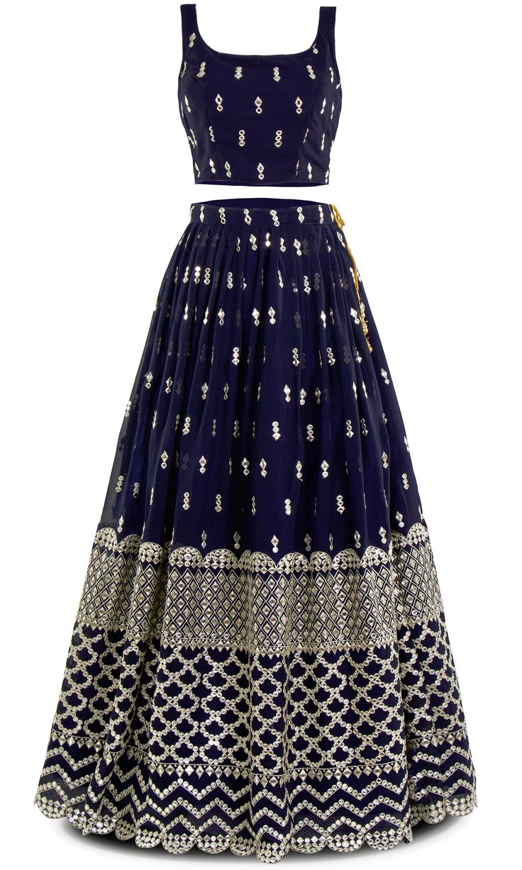 Navy never looked so fly! With mirror work that shines brighter than diamonds, this 3 piece lehenga screams elegance. Get ready to slay, because this lehenga doesn't just turn heads, it stops traffic. Embellished Floor-length Festive Skirt, Festive Floor-length Embellished Skirt, Festive Anarkali Embellished Skirt, Floor-length Skirt With Zari Work For Reception, Embellished Skirt For Reception And Festive Occasions, Festive Embellished Long Skirt, Floor-length Zari Work Skirt For Reception, Embellished Skirt For Festive Reception, Festive Embellished Skirt For Reception