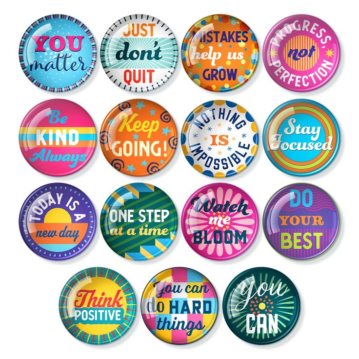 a bunch of badges with different sayings on them