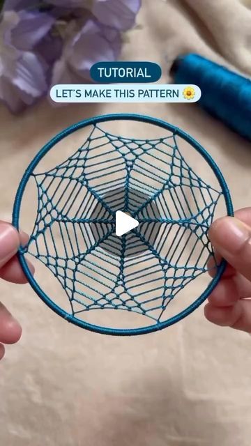 someone is holding a small wire object with the words, let's make this pattern