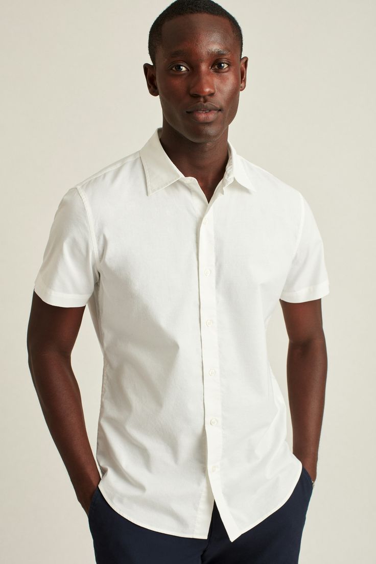 Stretch Riviera Short Sleeve Shirt | Bonobos Modern Cotton Tops For Semi-formal Occasions, Semi-formal Fitted Top With Collared Neckline, Slim Fit Shirt With Button Closure For Summer, Relaxed Fit Collared Shirt With Button Closure, Classic Summer Shirt With Fold Down Collar, Classic Button-up Shirt With Back Button Closure, Summer Shirt With Placket And Fold Down Collar, Solid Dress Shirt With Spread Collar For Spring, Summer Shirt With Fold Down Collar And Placket