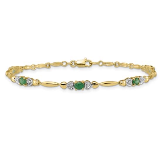 14k yellow gold and rhodium over 14k yellow gold diamond and 1.1 cttw emerald bracelet. Measures approximately 3/16 of an inch in width and has a lobster claw closure. Classic Bracelets With May Birthstone, May Birthstone Diamond Jewelry Stamped 14k, Fine Jewelry With Diamond Accents For May Birthstone, Classic May Birthstone Bracelets, Yellow Gold May Birthstone Bracelets For Anniversary, Yellow Gold Bracelets For Anniversary, May Birthstone, Classic Gold Tennis Bracelet With Emeralds, Classic Gold Bracelet With Birthstone, Gold Bracelets For Anniversary With May Birthstone