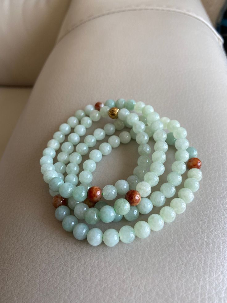 🌈 Jadeite Beaded (7.5mm) Necklace Bracelet, Green Brown Light Lavender, 108 beads 🌷 Untreated Natural Jadeite (Grade A Jade) 🌷 Jade from Myanmar/ Burma 🌷 100% handmade carving 🌷 Bead size : 7.5 MM 🌷 Number of Beads : 108 🌷 Color : Green, Brown & Light Lavender 🌷 Free shipping from Hong Kong with tracking number provided 🌷 Take approximately 7-28 days to arrive worldwide ❤️ In Chinese Culture: Young people wear jade pendant will have a prosperous life, attracts good luck and friendsh Meditation Jade Bracelet With 108 Beads, Jade Gemstone Beaded Bracelets For Meditation, Polished Beads Bracelet For Meditation, Round Gemstone Beads For Meditation, Meditation Beaded Bracelets With Polished Beads, Round Polished Beaded Bracelets For Meditation, Round Beads Aventurine Jewelry For Meditation, Aventurine Round Bead Jewelry For Meditation, Round Beaded Aventurine Jewelry For Meditation