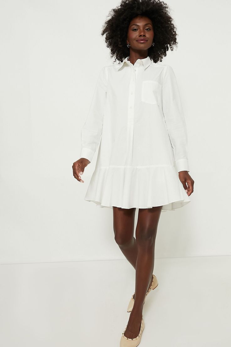 A sophisticated update to the closet staple shirt dress we love, the White Cotton Poplin Callahan perfectly merges classic and trendy. This mini seamlessly combines functional details like invisible side pockets and a button front half placket with a flirty flutter hemline to create a style that encapsulates unfussy femininity. We are pairing this tailored piece with flats or sneakers for a casual look and switching to heels when the occasion calls for it. Classic collar Long sleeves with button Jenny Bird, White Cotton Dress, Plus And Minus, Closet Staples, White Shirt Dress, The Closet, A Style, Drop Waist, Cotton Poplin