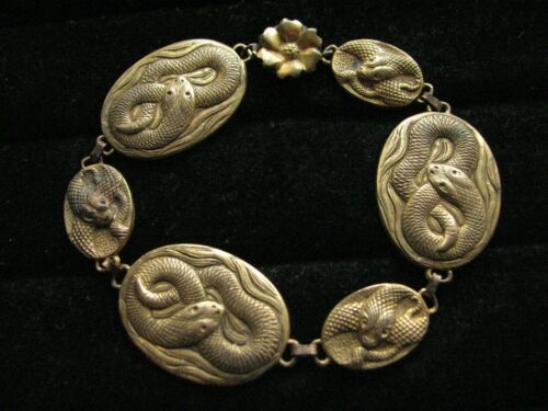 ANTIQUE ART DECO EGYPTIAN REVIVAL SNAKE FLOWER CHAIN WHIMSICAL GOTHIC BRACELET | eBay Victorian Brass Silver Bracelets, Antique Decorative Metal Jewelry, Engraved Metal Snake-shaped Jewelry, Vintage Snake-shape Jewelry For Formal Occasions, Antique Brass Collectible Bracelets, Vintage Snake-shaped Jewelry Gift, Vintage Snake Jewelry For Gifts, Collectible Art Deco Bangle Jewelry, Antique Gold Snake-shaped Jewelry