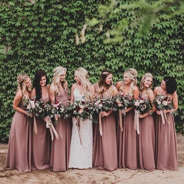 a group of women standing next to each other