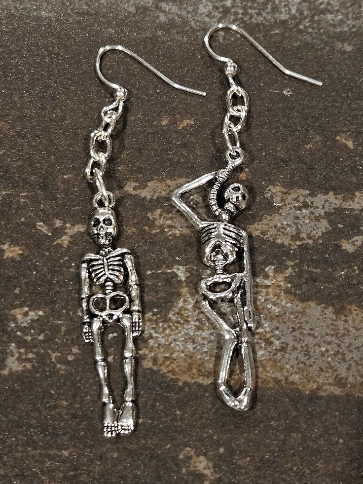 Killer silver earrings! Scary skeleton 💀 earrings! The charms on these killer earrings are 925 silver finish, and the entire earwire and ball are 925 STERLING SILVER. They hang approx 2-3" inches. The earwire is about .75", and the skeleton charms are approximately 2"inches long.  They are very lightweight.  Thanks, Enjoy! #awesome #killer #postpunk #rocker #bikerchick #gothic #punk #tattoos #unisex #medieval #gift #kitschy #925sterlingsilver #anime #earrings #skulls #skeleton #horror #badass Punk Skull Jewelry For Halloween, Punk Style Skull Jewelry For Halloween, Edgy Pierced Halloween Earrings, Edgy Halloween Pierced Earrings, Edgy Pierced Earrings For Halloween, Gothic Skull Earrings For Halloween, Emo Metal Earrings For Halloween, Punk Style Hand Cast Halloween Jewelry, Edgy Nickel-free Skull Earrings