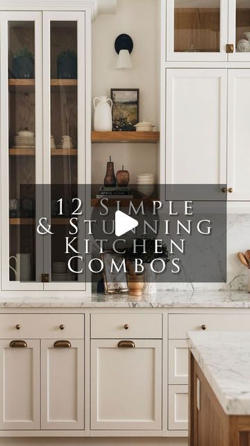 a kitchen with white cabinets and marble counter tops