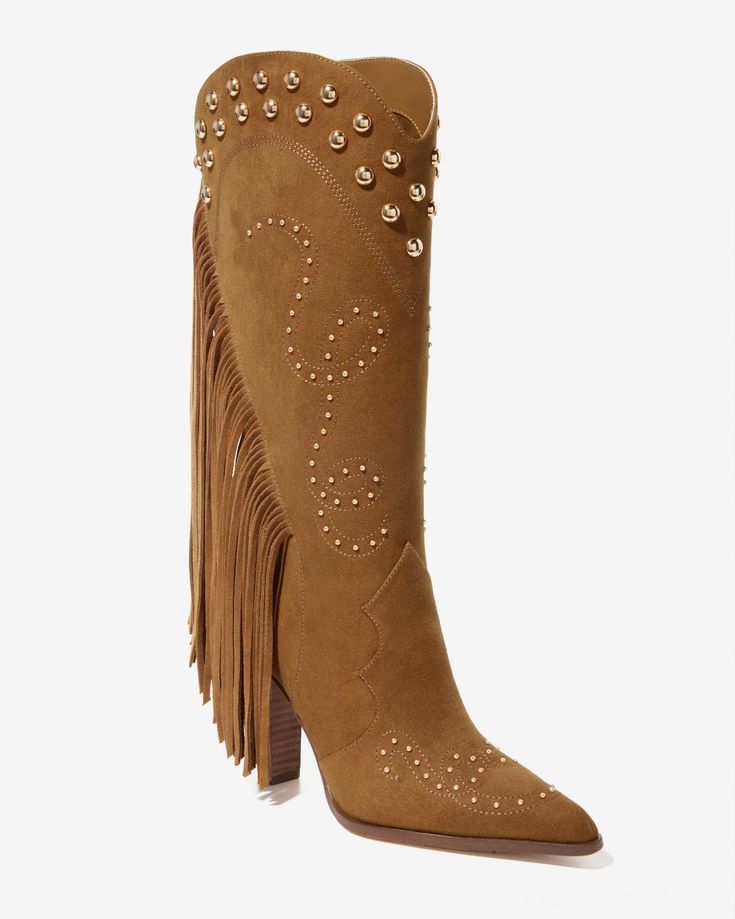 Step out into colder weather in our Fringe Studded Boot. With a luxe suede finish, bold fringe detailing, and eye-catching studded accents, this Western-inspired boot offers effortless pull-on style, making it a standout piece for your seasonal wardrobe. Western Boots With Rhinestone Fringe For Fall, Western Rhinestone Fringe Boots For Fall, Western Boots With Tassels For Fall, Western Style Boots With Tassels For Fall, Winter Boots With Rhinestone Fringe, Western Suede Boots With Tassels, Western Suede Fringe Boots, Western Style Suede Boots With Fringe, Western Fringe Boots For Fall