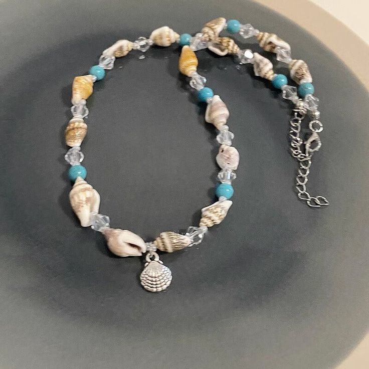 Introducing our Ocean Series Shell Conch Necklace, a perfect accessory to evoke the spirit of summer and coastal vibes. This necklace features a shell and Conch Necklace, Mens Chain Bracelet, Coastal Vibes, Starfish Necklace, Fashion Pendant, Wire Bangles, Summer Necklace, Women Necklace, Conch Shell