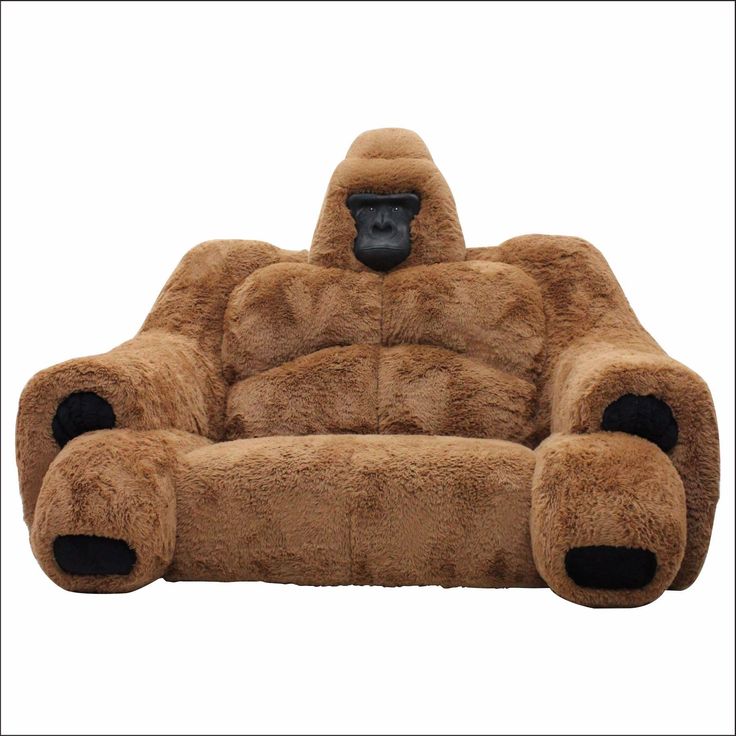 a chair made out of fake fur with a gorilla face on it's back