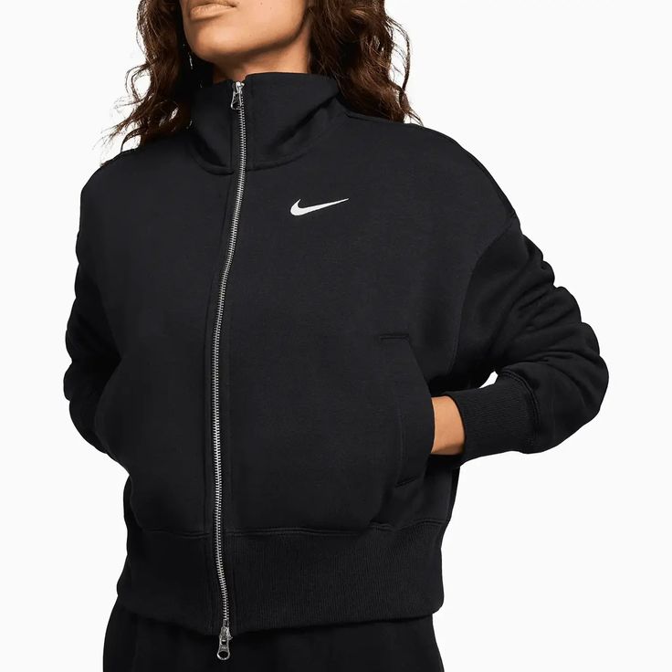 Nike Sportswear Phoenix FleeceWomen's Oversized Track JacketGrounded in style, comfort and versatility, meet our take on luxury loungewear. Made with midweight brushed fleece, this slightly cropped, oversized track jacket helps you step out with a laid-back look. The 2-way zipper gives you styling options. Mix and match within your wardrobe or wear it as part of a matching set.Our midweight brushed fleece feels extra soft and smooth on the outside, helping you stay cozy while keeping its structu Nike Phoenix Fleece, Nike Sportswear Phoenix Fleece, Fleece Outfit, Luxury Loungewear, Women's Sportswear, Loungewear Luxury, Nike Sweatshirts, Sportswear Women, Embroidered Sweatshirts