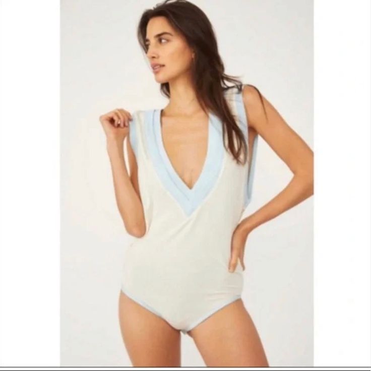 Questions? Leave A Comment Below! White V-neck Tops For Poolside, Cream Sleeveless Swimwear For Summer, Spring Beige V-neck Bodysuit, Beige V-neck Bodysuit For Spring, Beige Summer Bodysuit For Loungewear, Beige Bodysuit For Summer Loungewear, Cream Sleeveless Bodysuit For The Beach, White V-neck Summer Bodysuit, Cream Bodysuit For Summer Loungewear