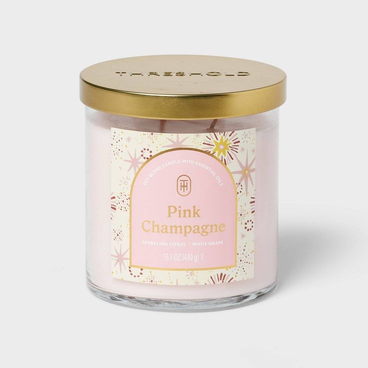 pink champagne candle with gold lid